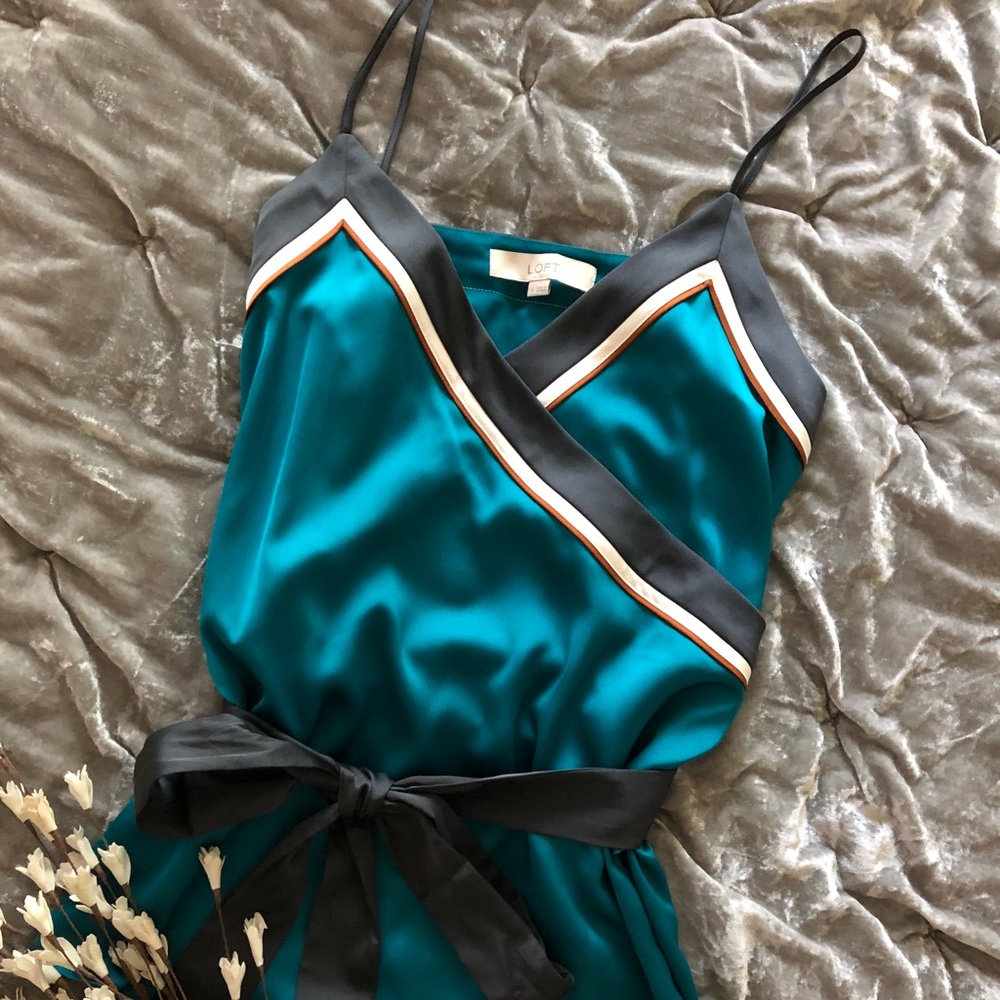 Turquoise blouse. Medium. Never worn.